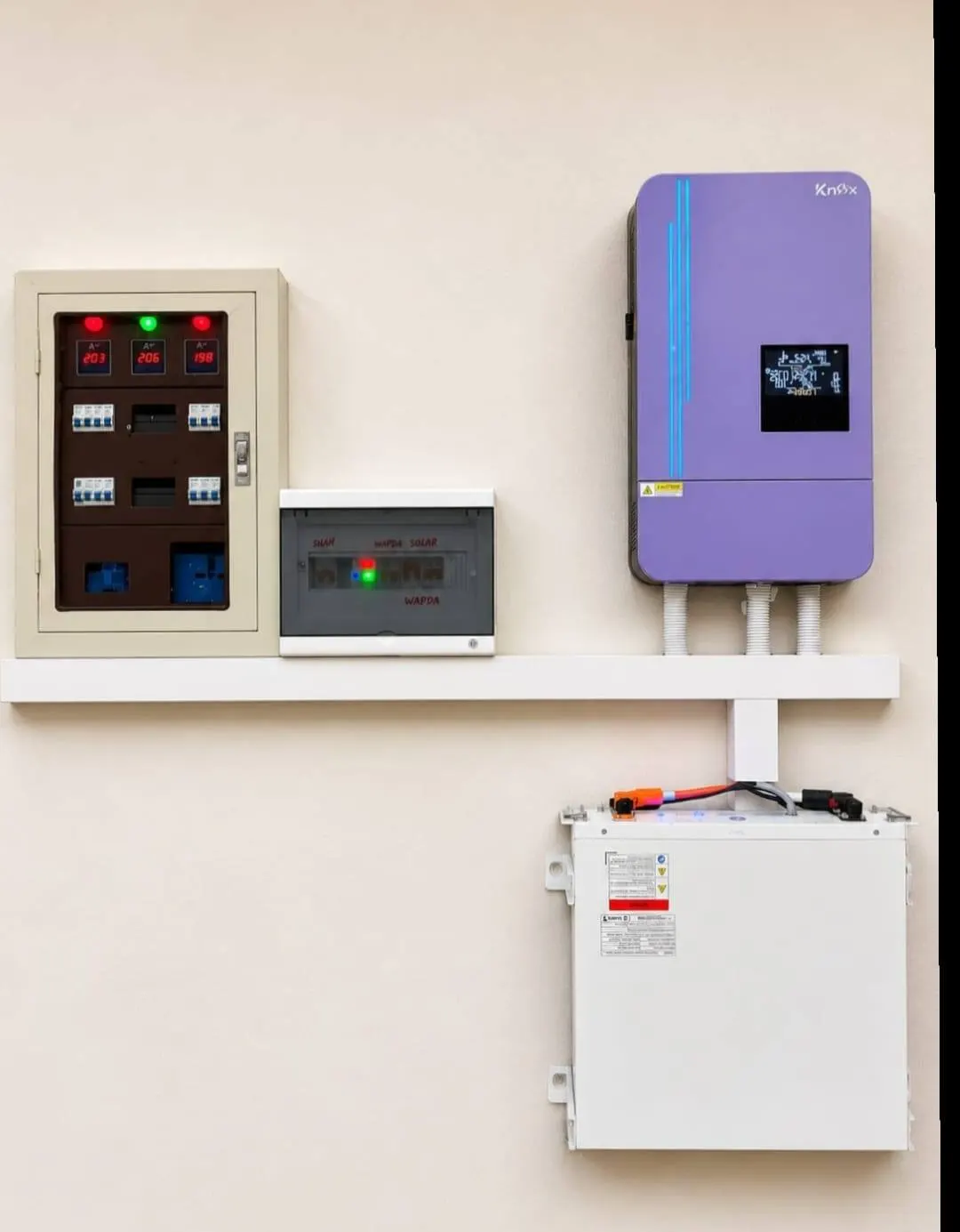 Purple cased inverter with a protection board and a wall lithium battery